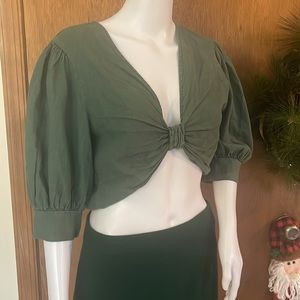 Crop top, army, green, three-quarter sleeve… A little puffy. NWT by YFB.